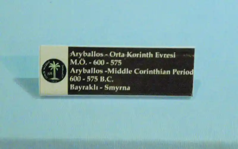 Description of pre-Christian crosses painted on figurine, dated 600-575 BC, located at Archaeological Museum of Izmir, Turkey